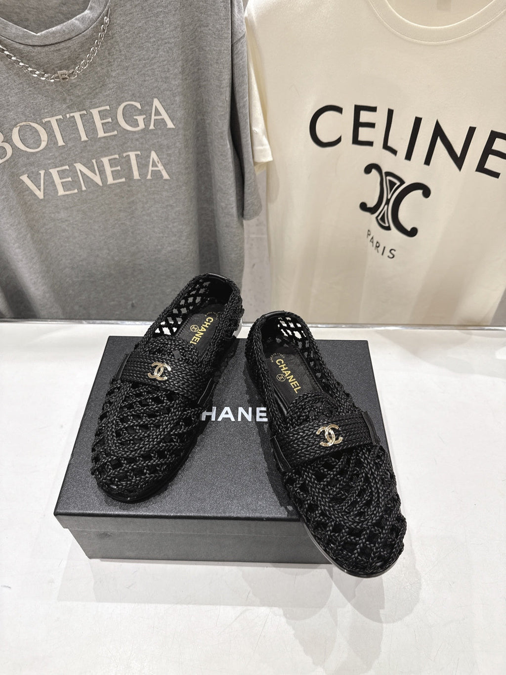 CHANEL 26S BRAIDED MULE IN BLACK WOVEN LEATHER