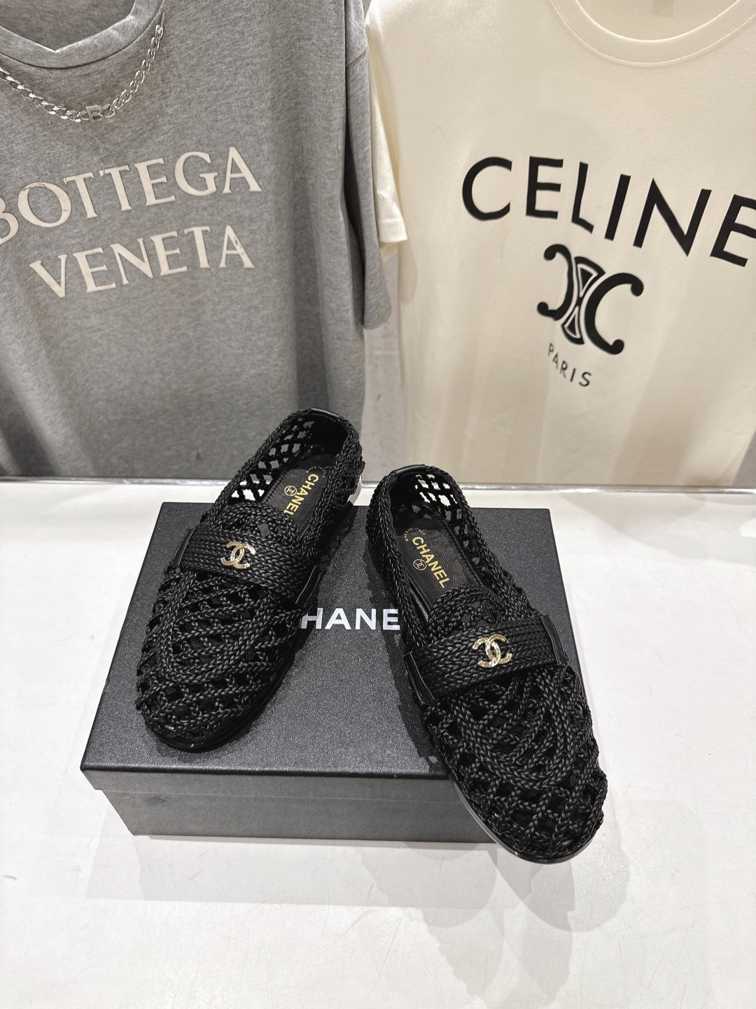 CHANEL 26S BRAIDED MULE IN BLACK WOVEN LEATHER