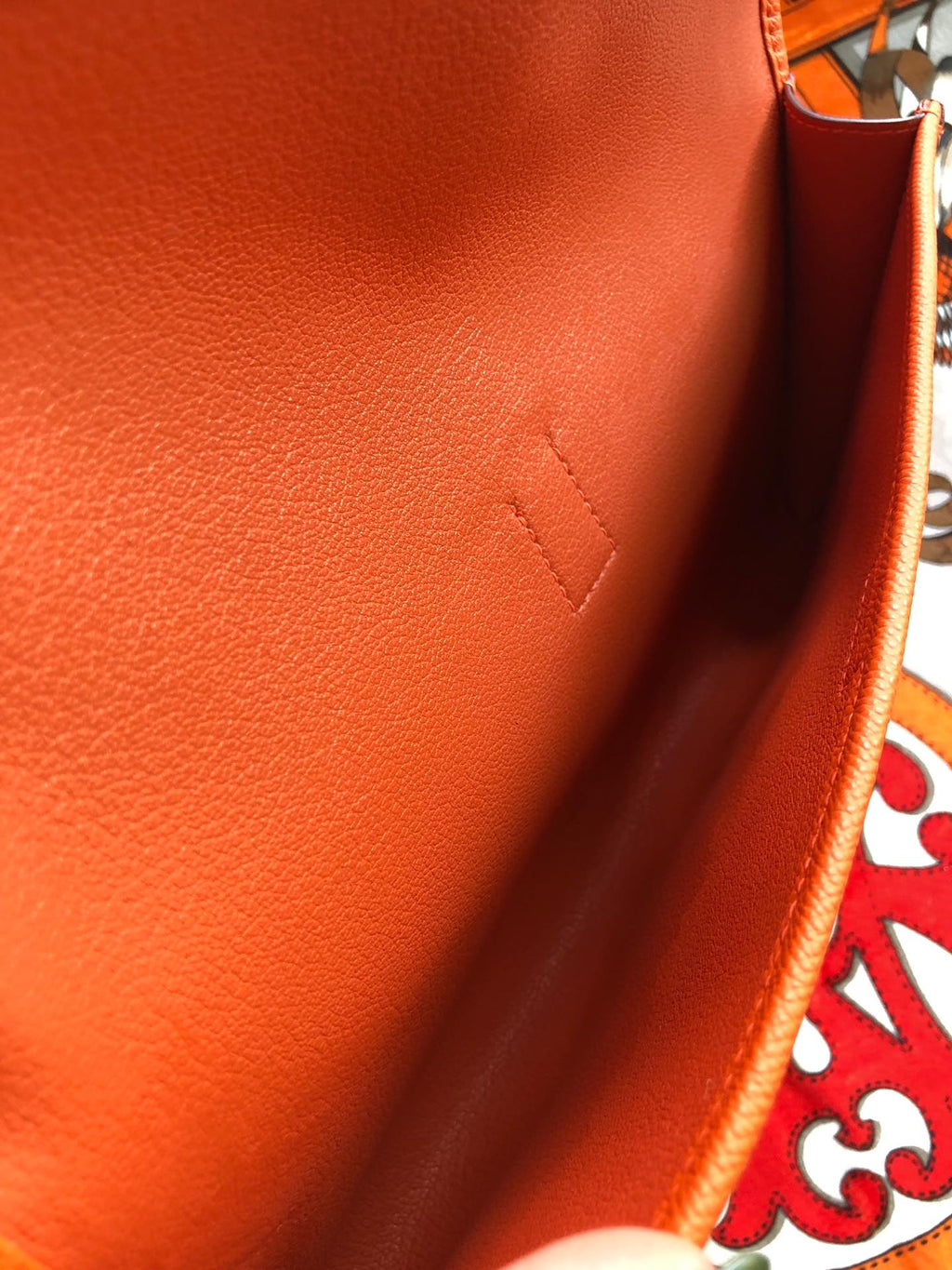 JIGE ELAN 29 CLUTCH IN SALAMANDER ORANGE CALFSKIN