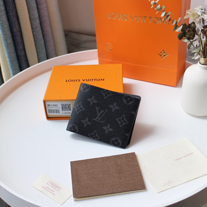 LV 25S MULTIPLE WALLET IN MONOGRAM ECLIPSE COATED CALFSKIN