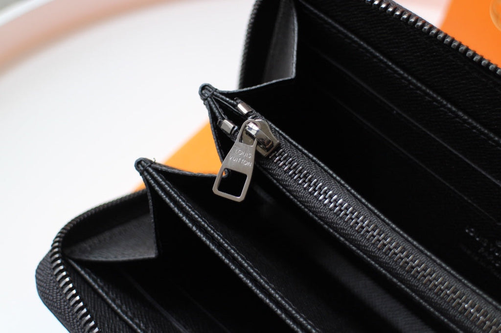 LV 25S ZIPPY WALLET HORIZONTAL 19 IN MONOGRAM ECLIPSE COATED CALFSKIN