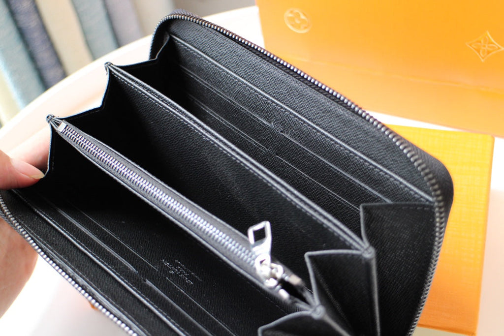 LV 25S ZIPPY WALLET HORIZONTAL 19 IN MONOGRAM ECLIPSE COATED CALFSKIN