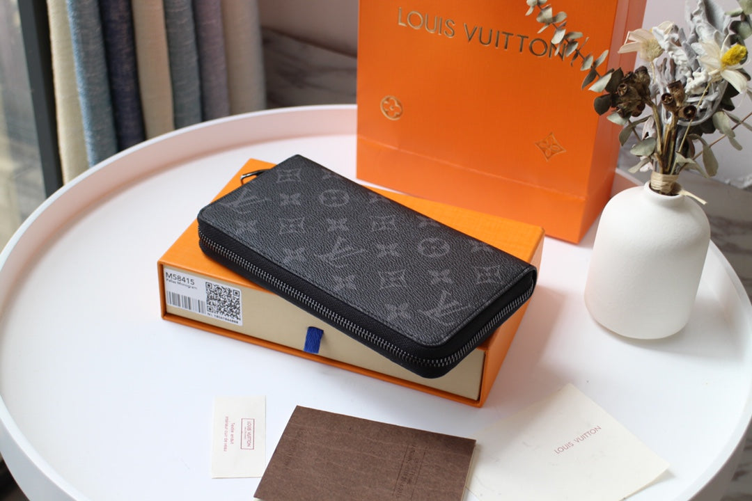LV 25S ZIPPY WALLET HORIZONTAL 19 IN MONOGRAM ECLIPSE COATED CALFSKIN