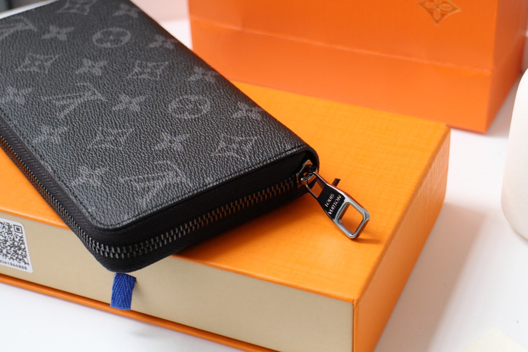 LV 25S ZIPPY WALLET HORIZONTAL 19 IN MONOGRAM ECLIPSE COATED CALFSKIN