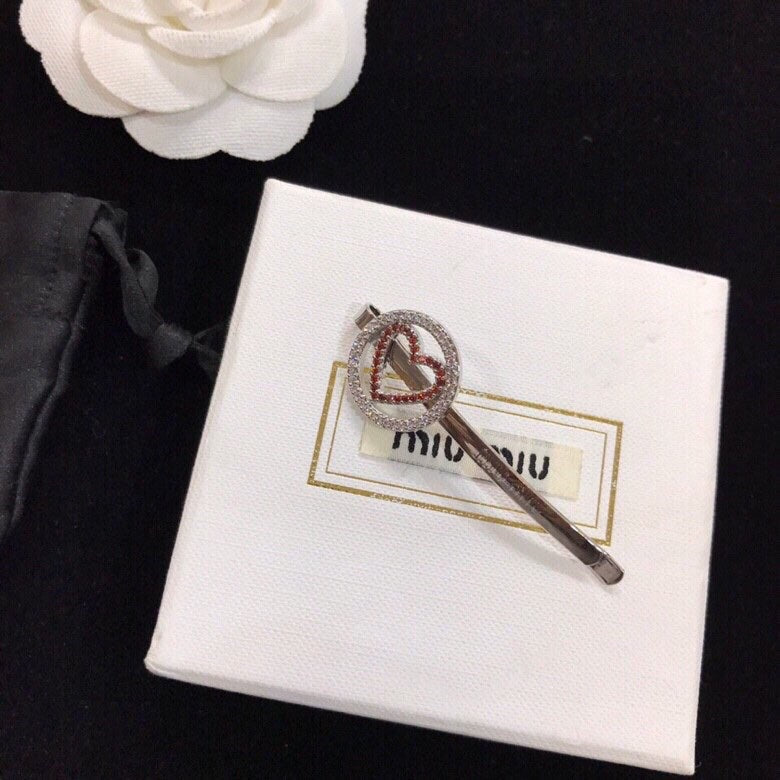 MIUMIU 26S CRYSTAL HEART LOGO HAIR CLIP IN SILVER TONE METAL 617641