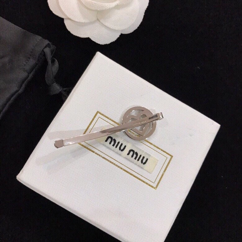MIUMIU 26S CRYSTAL HEART LOGO HAIR CLIP IN SILVER TONE METAL 617641