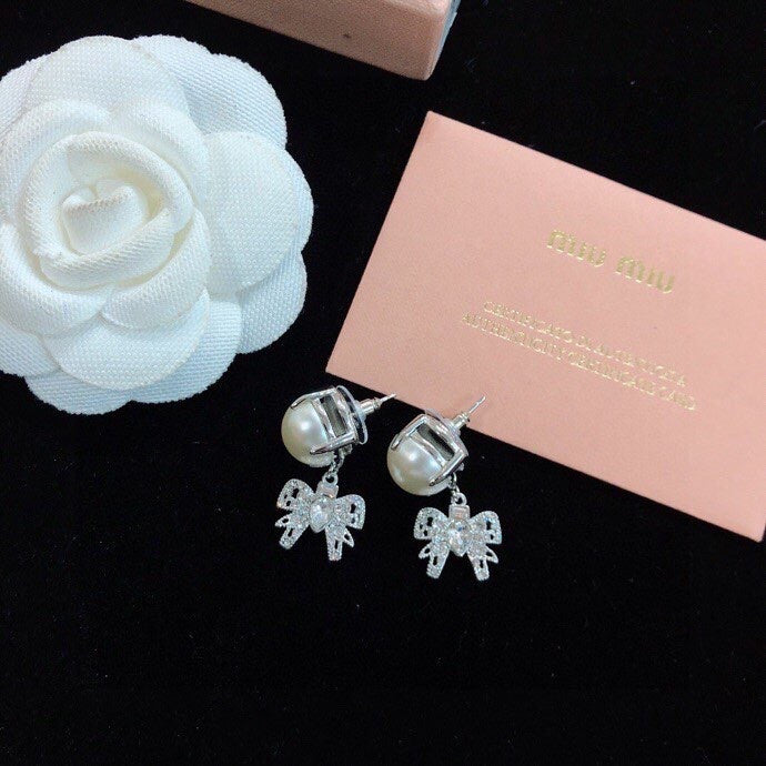 MIUMIU 26S PEARL BOW DROP EARRINGS WITH CRYSTALS IN SILVER TONE METAL 633769