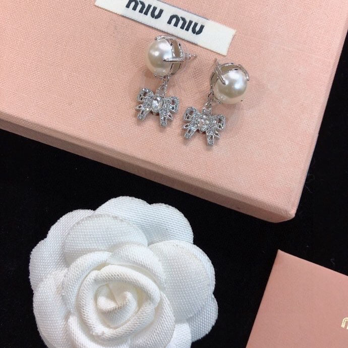 MIUMIU 26S PEARL BOW DROP EARRINGS WITH CRYSTALS IN SILVER TONE METAL 633769