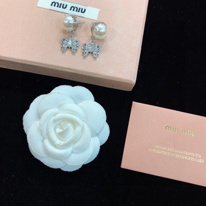MIUMIU 26S PEARL BOW DROP EARRINGS WITH CRYSTALS IN SILVER TONE METAL 633769