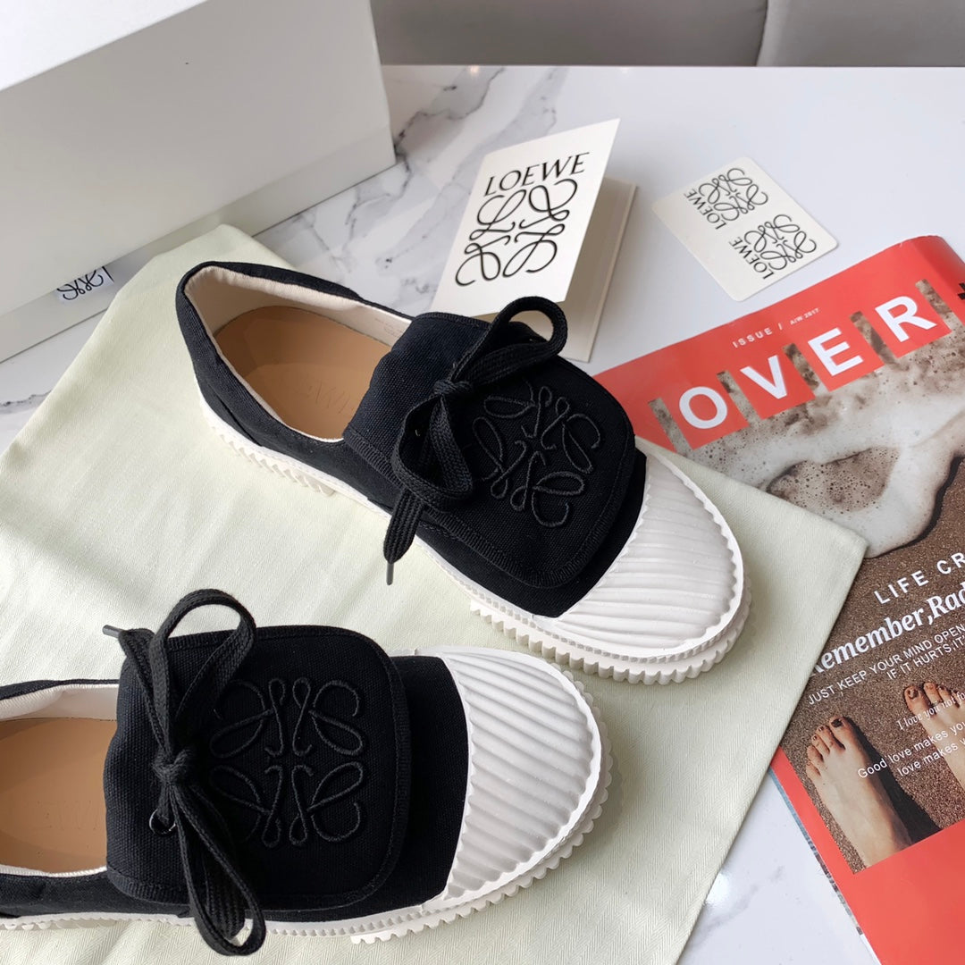 LOEWE 26S ANAGRAM FLAP SNEAKERS IN BLACK CANVAS
