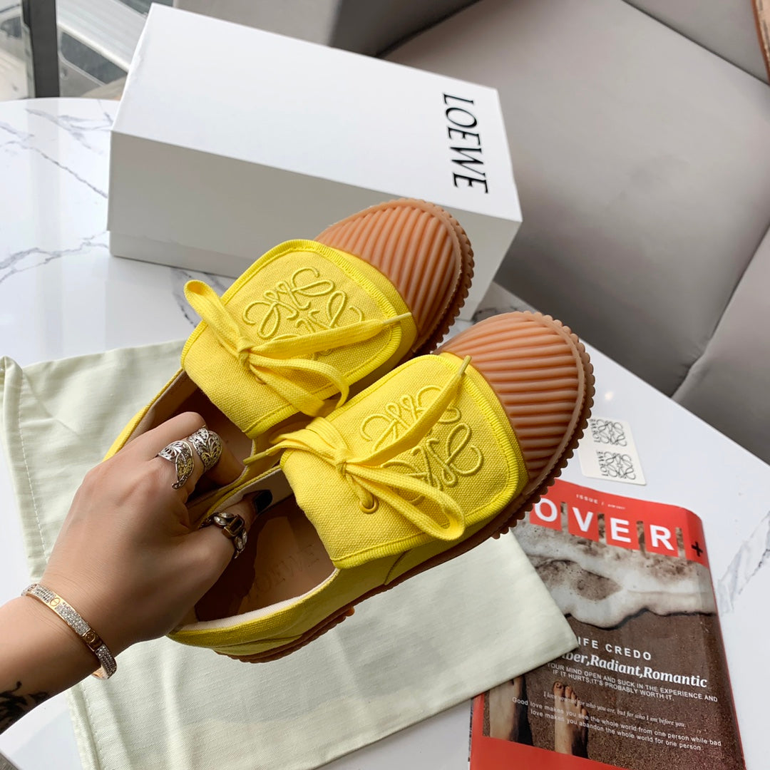 LOEWE 26S ANAGRAM FLAP SNEAKERS IN YELLOW CANVAS