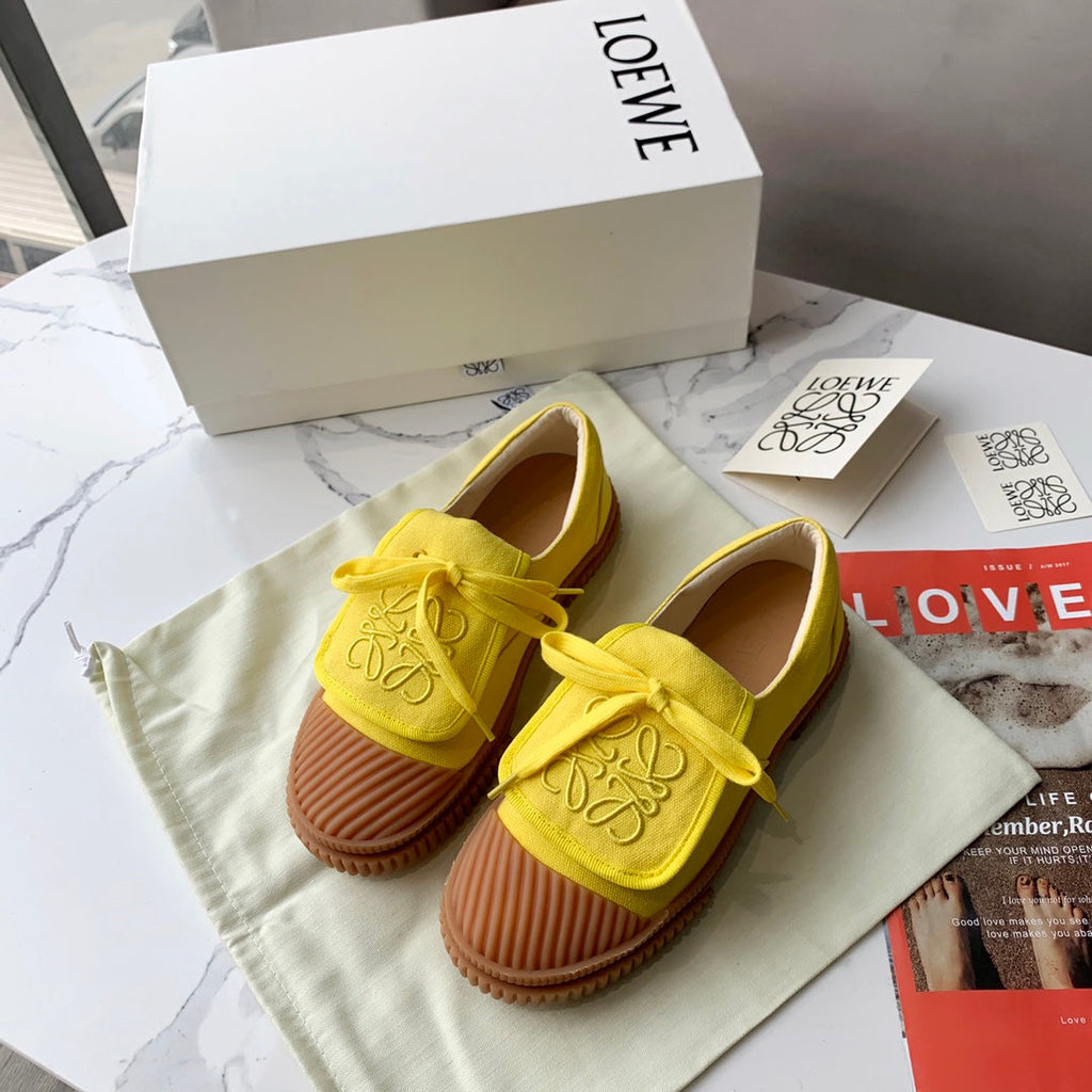 LOEWE 26S ANAGRAM FLAP SNEAKERS IN YELLOW CANVAS