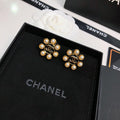 CHANEL 26S DOUBLE C LOGO PEARL HALO STUD EARRINGS IN BLACK ENAMEL & GOLD METAL 633332