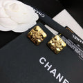 CHANEL 26S DOUBLE C LOGO EMBOSSED QUILTED SQUARE STUD EARRINGS IN GOLD METAL 633224