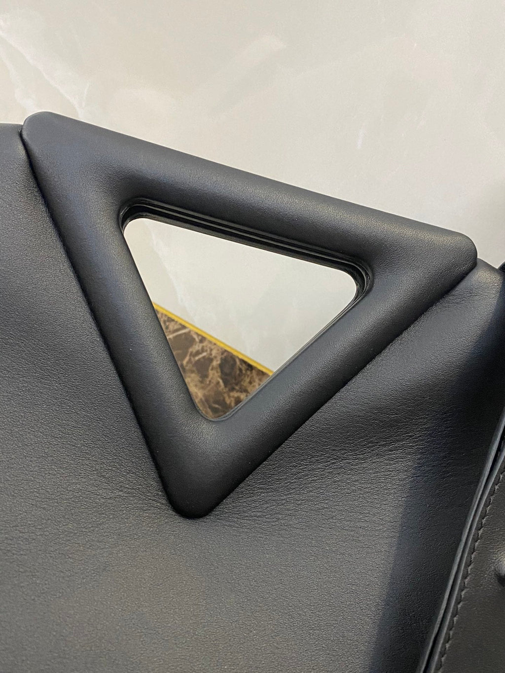 TRIANGLE HANDLE BAG 31 IN BLACK LAMBSKIN