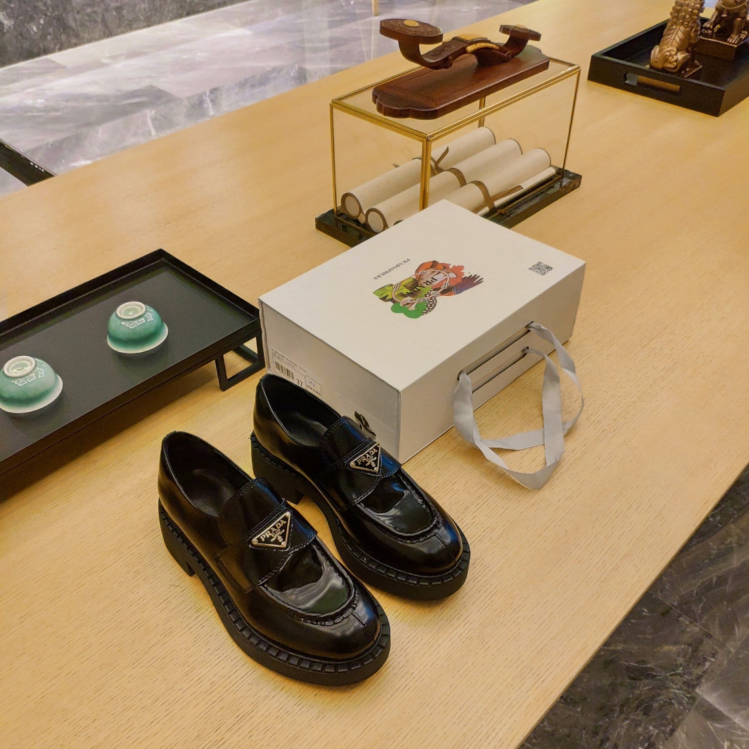 PRADA 26S PENNY LOAFERS 55MM IN DARK GREEN PATENT CALFSKIN