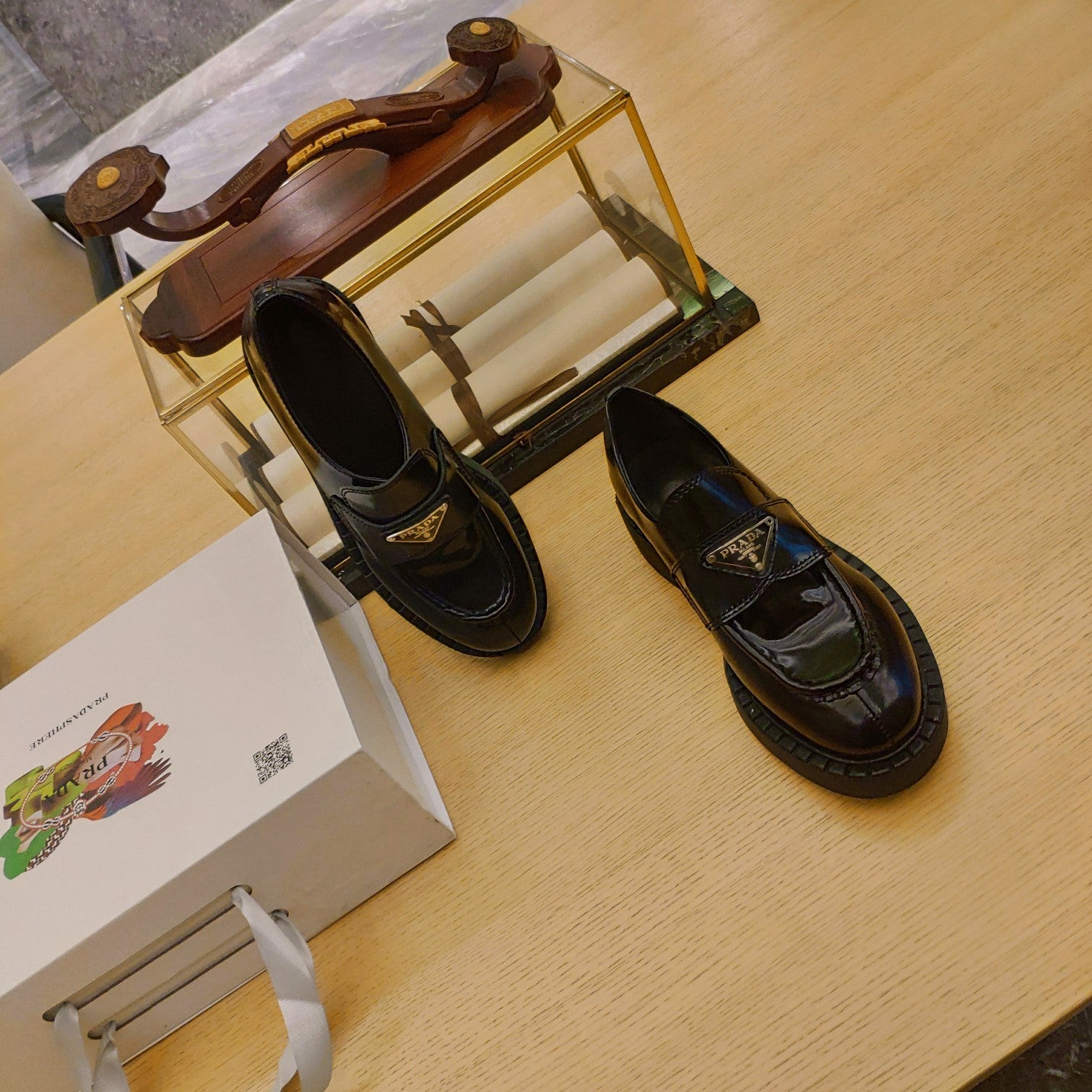 PRADA 26S PENNY LOAFERS 55MM IN DARK GREEN PATENT CALFSKIN
