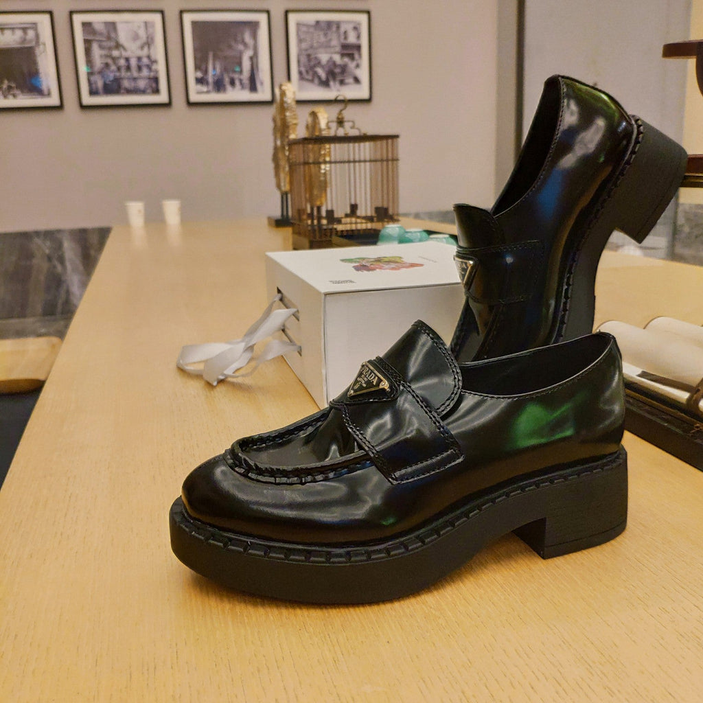 PRADA 26S PENNY LOAFERS 55MM IN DARK GREEN PATENT CALFSKIN