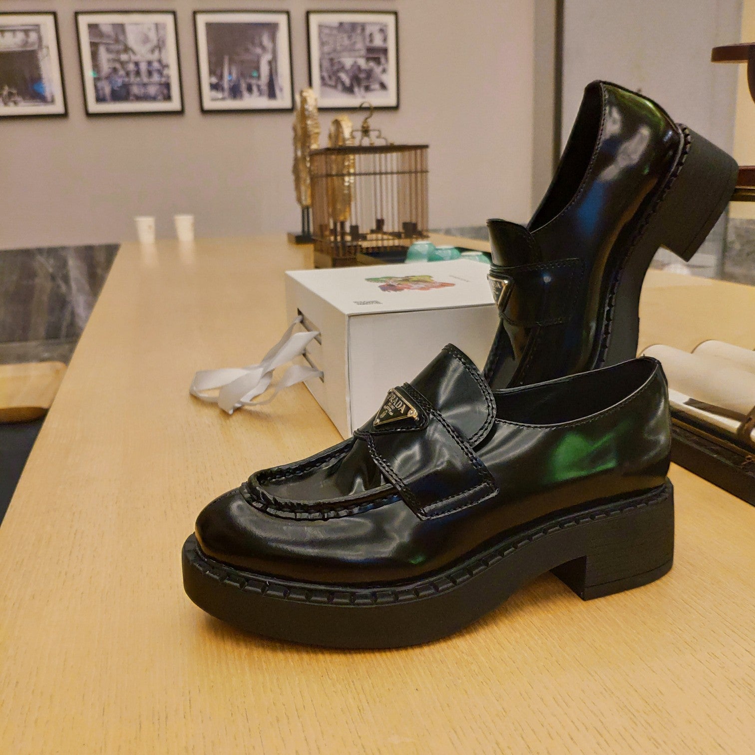 PRADA 26S PENNY LOAFERS 55MM IN DARK GREEN PATENT CALFSKIN