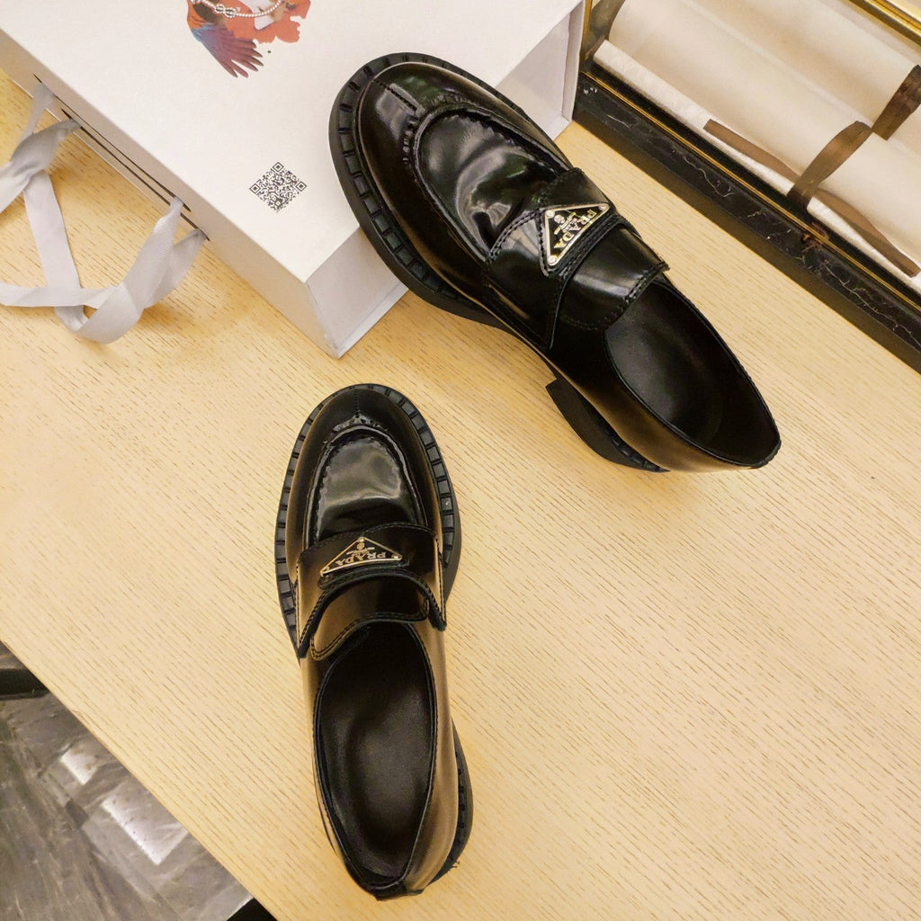PRADA 26S PENNY LOAFERS 55MM IN DARK GREEN PATENT CALFSKIN