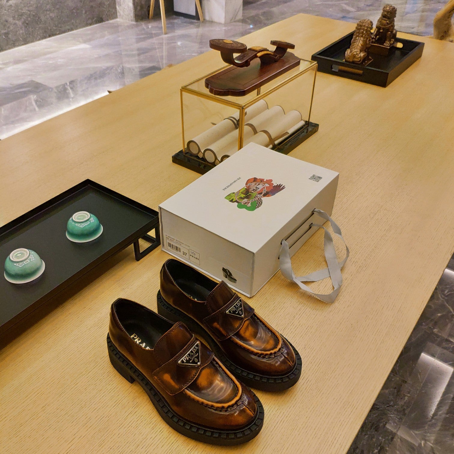 PRADA 26S PENNY LOAFERS 55MM IN BROWN PATENT CALFSKIN