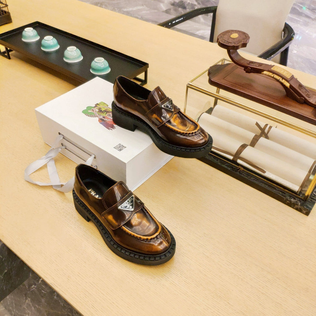 PRADA 26S PENNY LOAFERS 55MM IN BROWN PATENT CALFSKIN