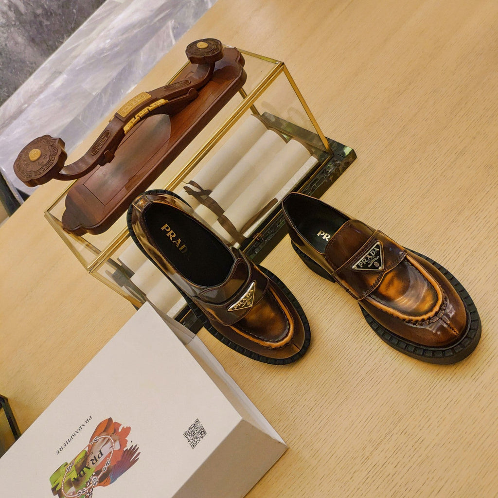 PRADA 26S PENNY LOAFERS 55MM IN BROWN PATENT CALFSKIN
