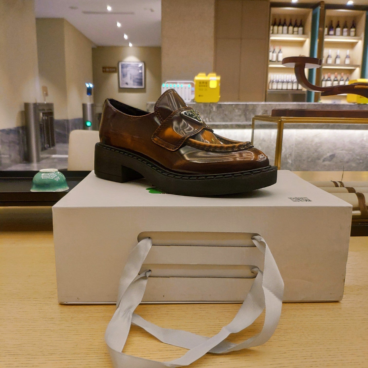 PRADA 26S PENNY LOAFERS 55MM IN BROWN PATENT CALFSKIN