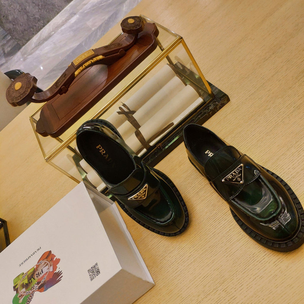 PRADA 26S PENNY LOAFERS 55MM IN GREEN PATENT CALFSKIN
