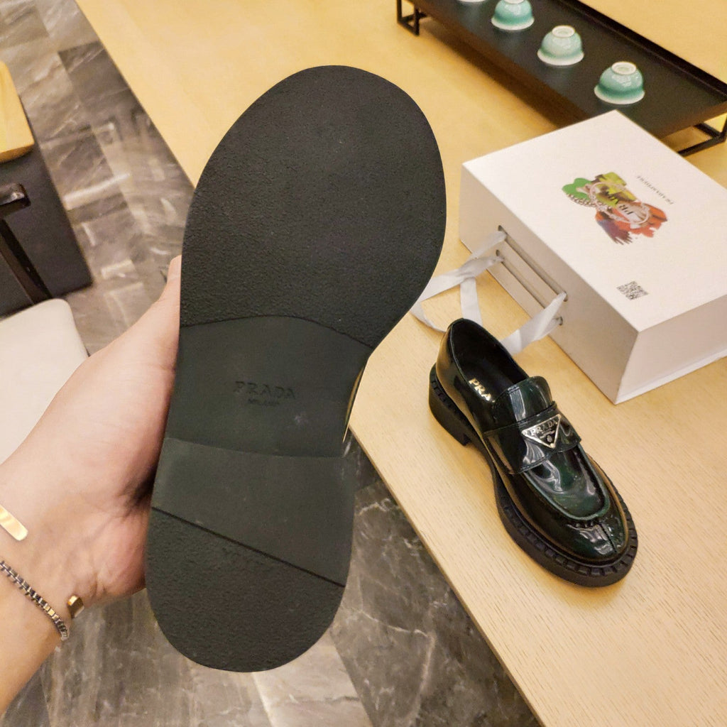 PRADA 26S PENNY LOAFERS 55MM IN GREEN PATENT CALFSKIN