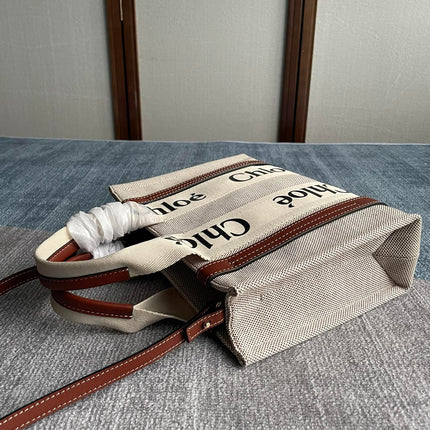 SMALL STRAP WOODY TOTE BAG 26.5 IN BEIGE LINEN CANVAS BLACK WEBBING LOGO EMBROIDER BROWN CALFSKIN
