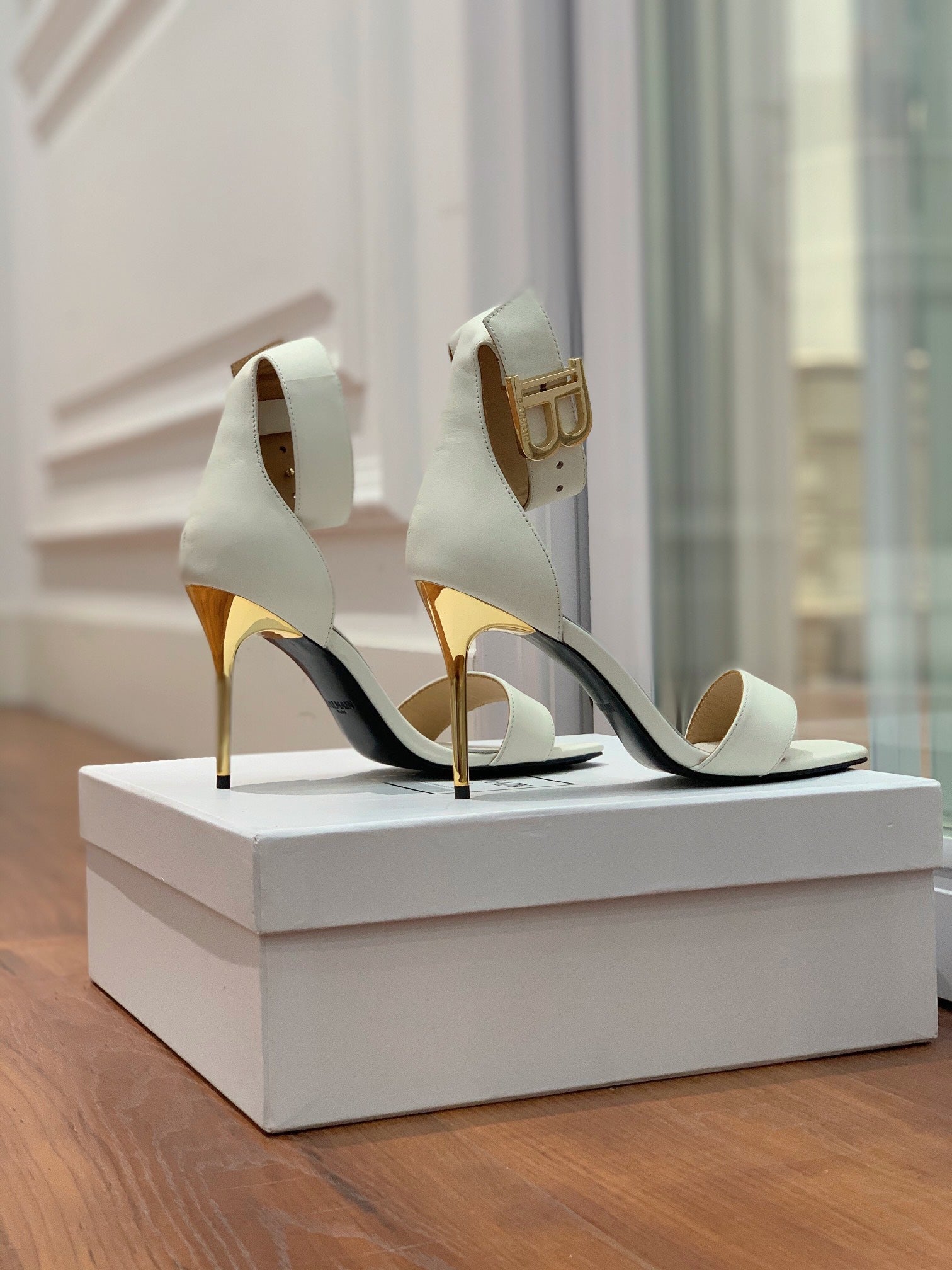 BALMAIN 25S THIN STRAP HIGH HEELS 105MM IN IVORY CALFSKIN GOLD HARDWARE