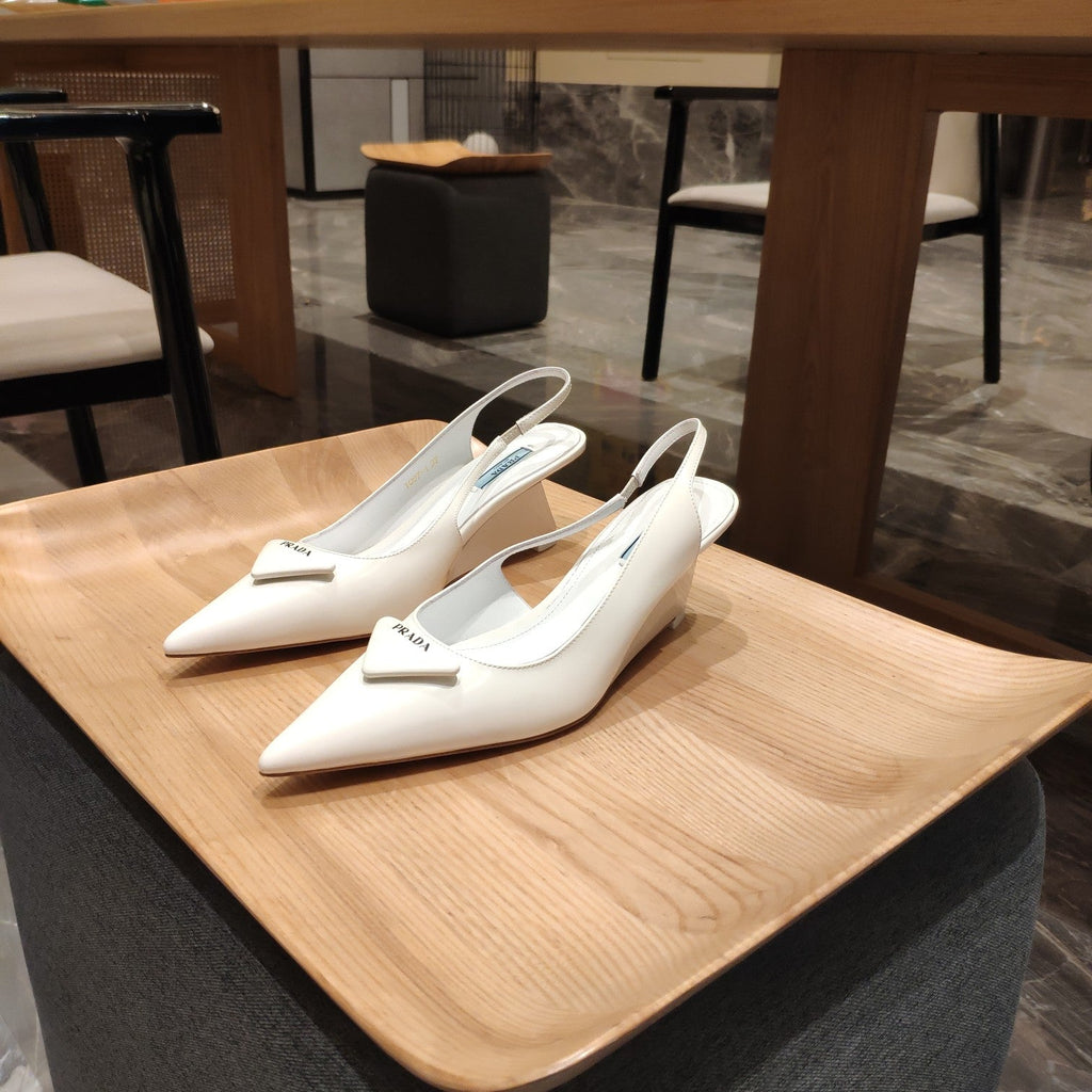 PRADA 26S POINTED TOE WEDGE SLINGBACK PUMPS IN IVORY WHITE CALFSKIN