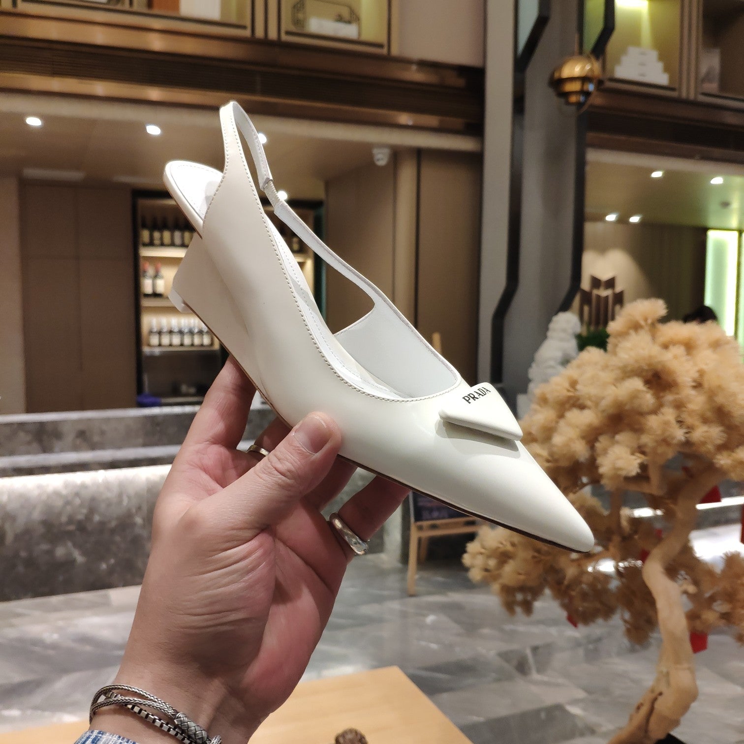 PRADA 26S POINTED TOE WEDGE SLINGBACK PUMPS IN IVORY WHITE CALFSKIN