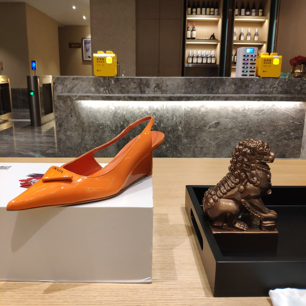 PRADA 26S POINTED TOE WEDGE SLINGBACK PUMPS IN ORANGE PATENT CALFSKIN
