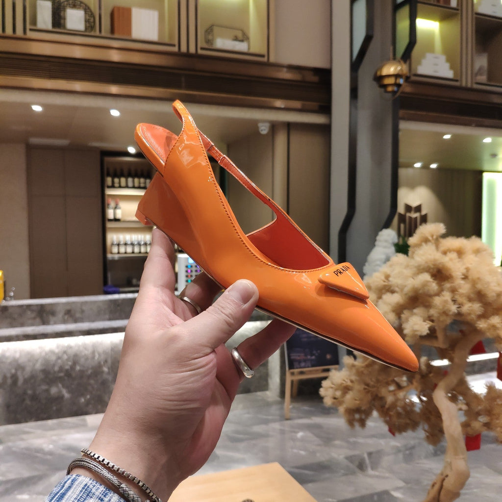 PRADA 26S POINTED TOE WEDGE SLINGBACK PUMPS IN ORANGE PATENT CALFSKIN