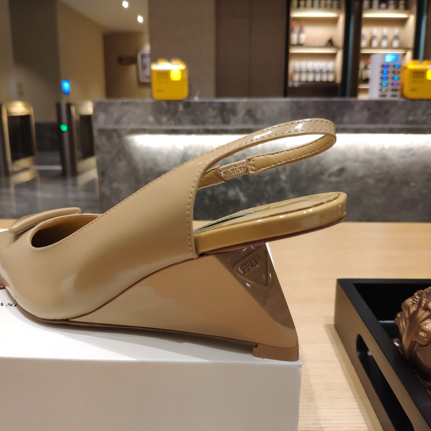 PRADA 26S POINTED TOE WEDGE SLINGBACK PUMPS IN BEIGE PATENT CALFSKIN
