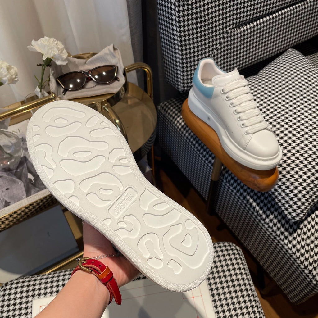 OVERSIZED SNEAKERS IN WHITE CALFSKIN WITH BLUE RUBBER HEEL TAB