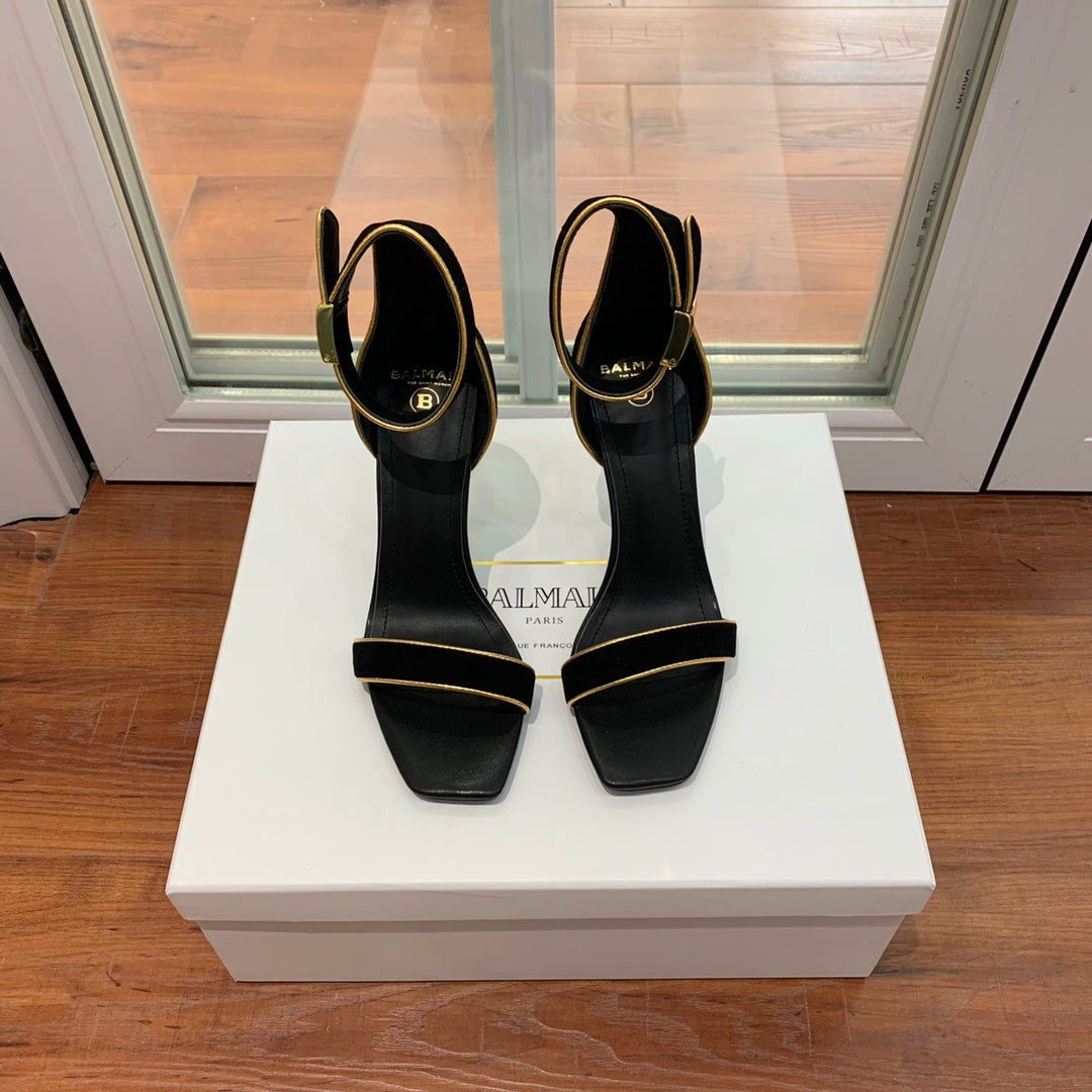 BALMAIN 25S UMA HEELED SANDALS 105MM IN BLACK SUEDE GOLD HARDWARE