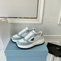 PRADA 25S THICK SOLE SNEAKER IN WHITE AND LIGHT BLUE CALFSKIN