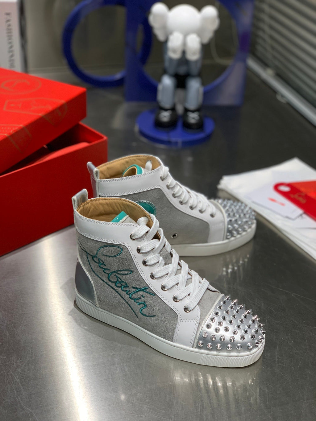 EMBROIDERED LOU SPIKES HIGH-TOP SNEAKERS IN GREY SUEDE MIX CALFSKIN
