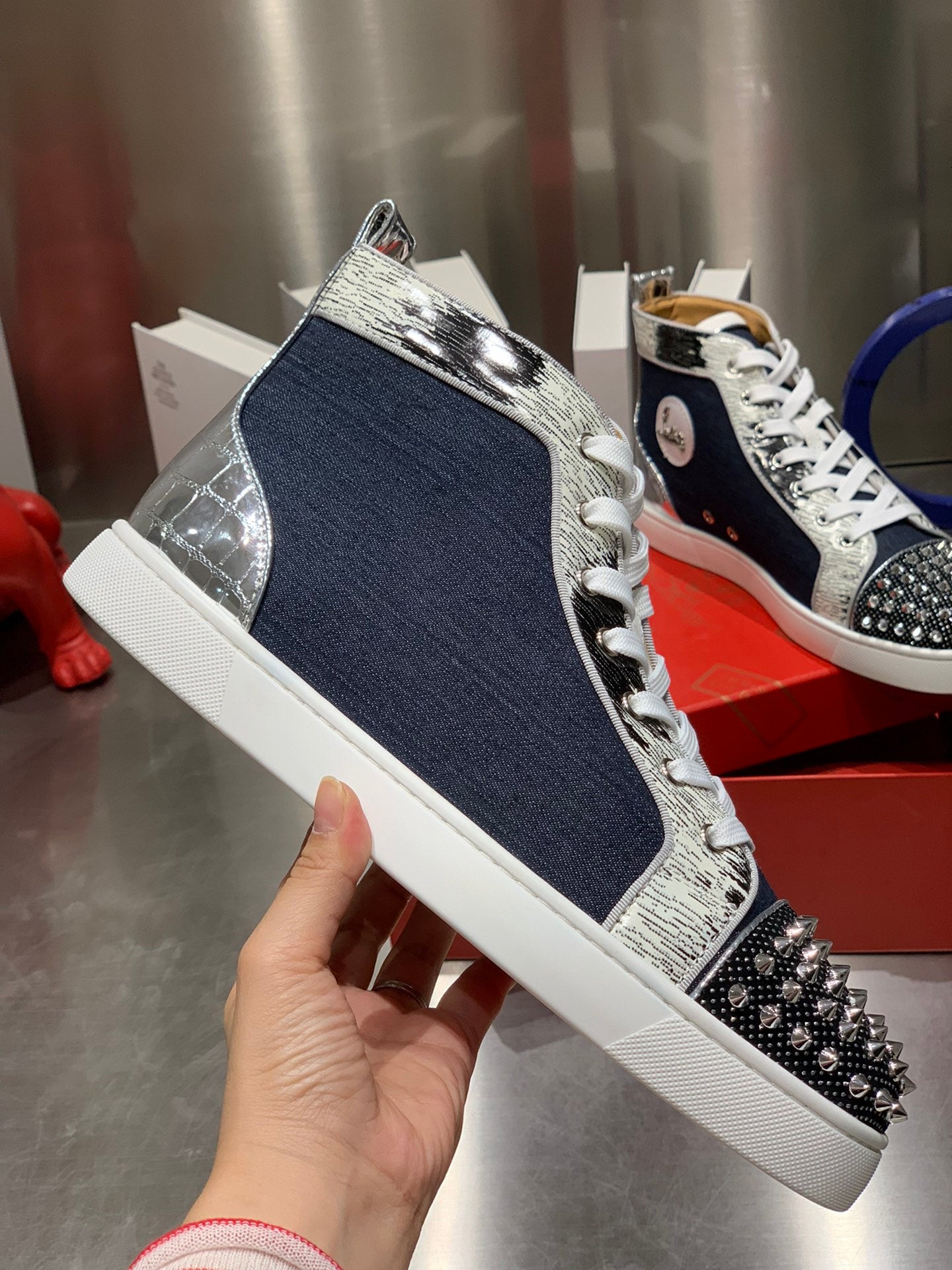LOU SPIKES STUDDED HIGH-TOP SNEAKERS IN NAVY BLUE FABRIC AND CALFSKIN