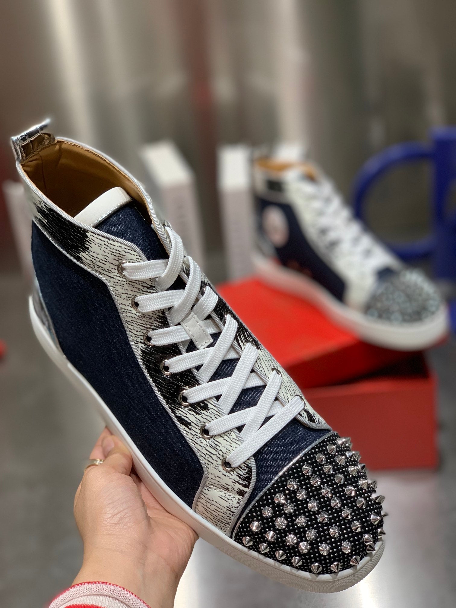 LOU SPIKES STUDDED HIGH-TOP SNEAKERS IN NAVY BLUE FABRIC AND CALFSKIN