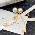 CD 26S PEARL STAR CHAIN DROP EARRINGS IN GOLD TONE METAL 645638
