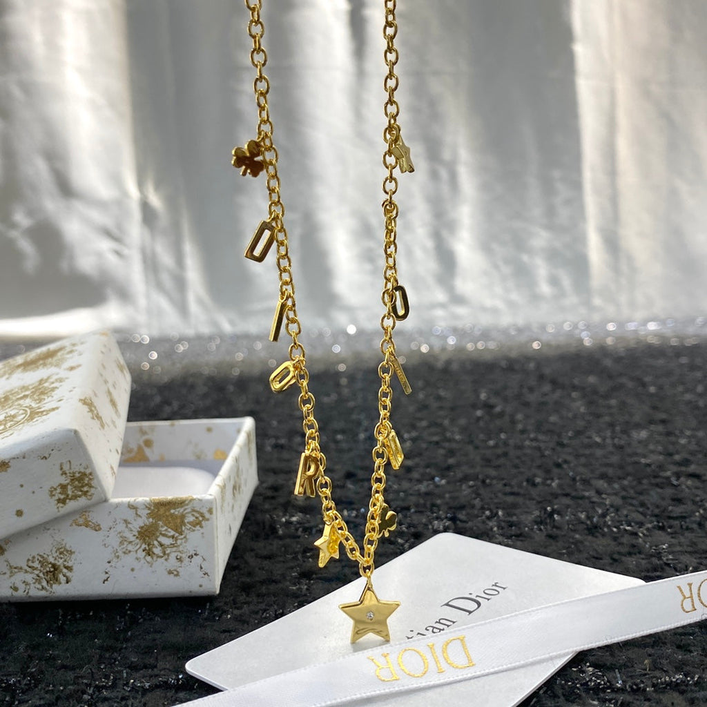 CD 26S DIOR LETTER CHARM STAR NECKLACE IN GOLD TONE METAL 631848