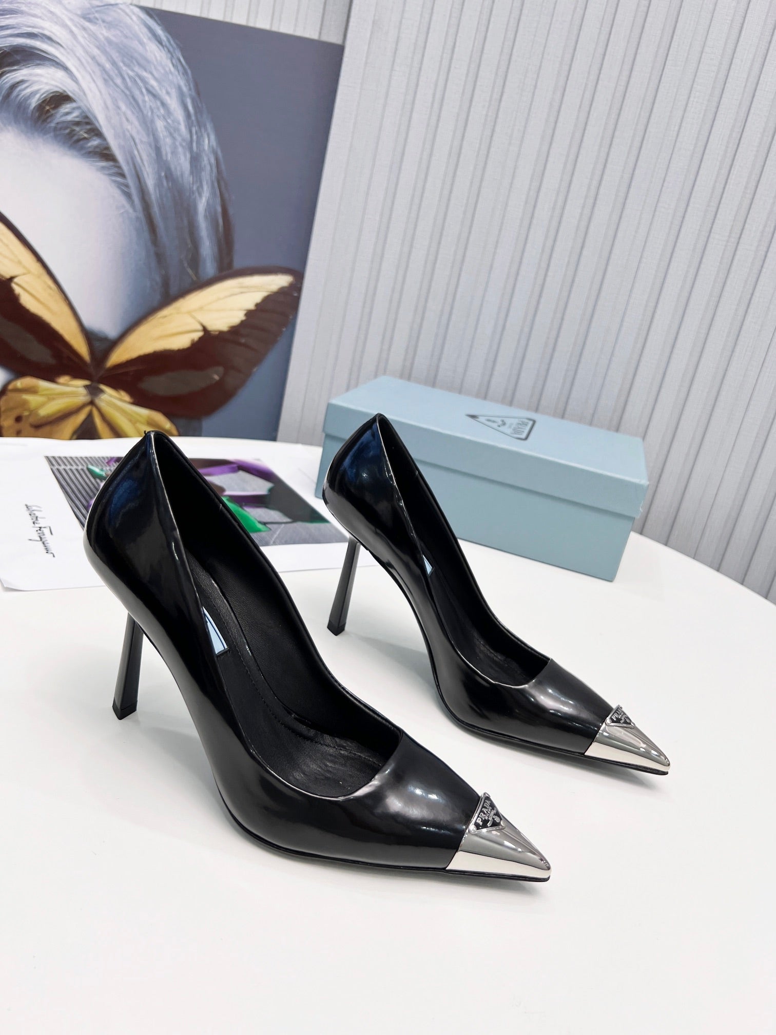 PRADA 26S PUMPS STILETTO HEEL 95MM IN BLACK METAL TIP CALFSKIN