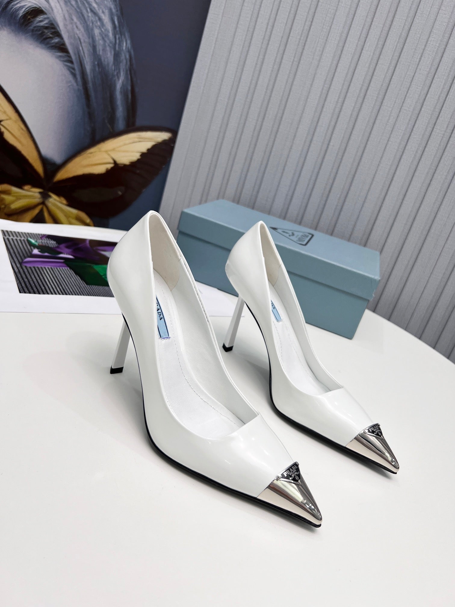 PRADA 26S PUMPS STILETTO HEEL 95MM IN WHITE METAL TIP CALFSKIN