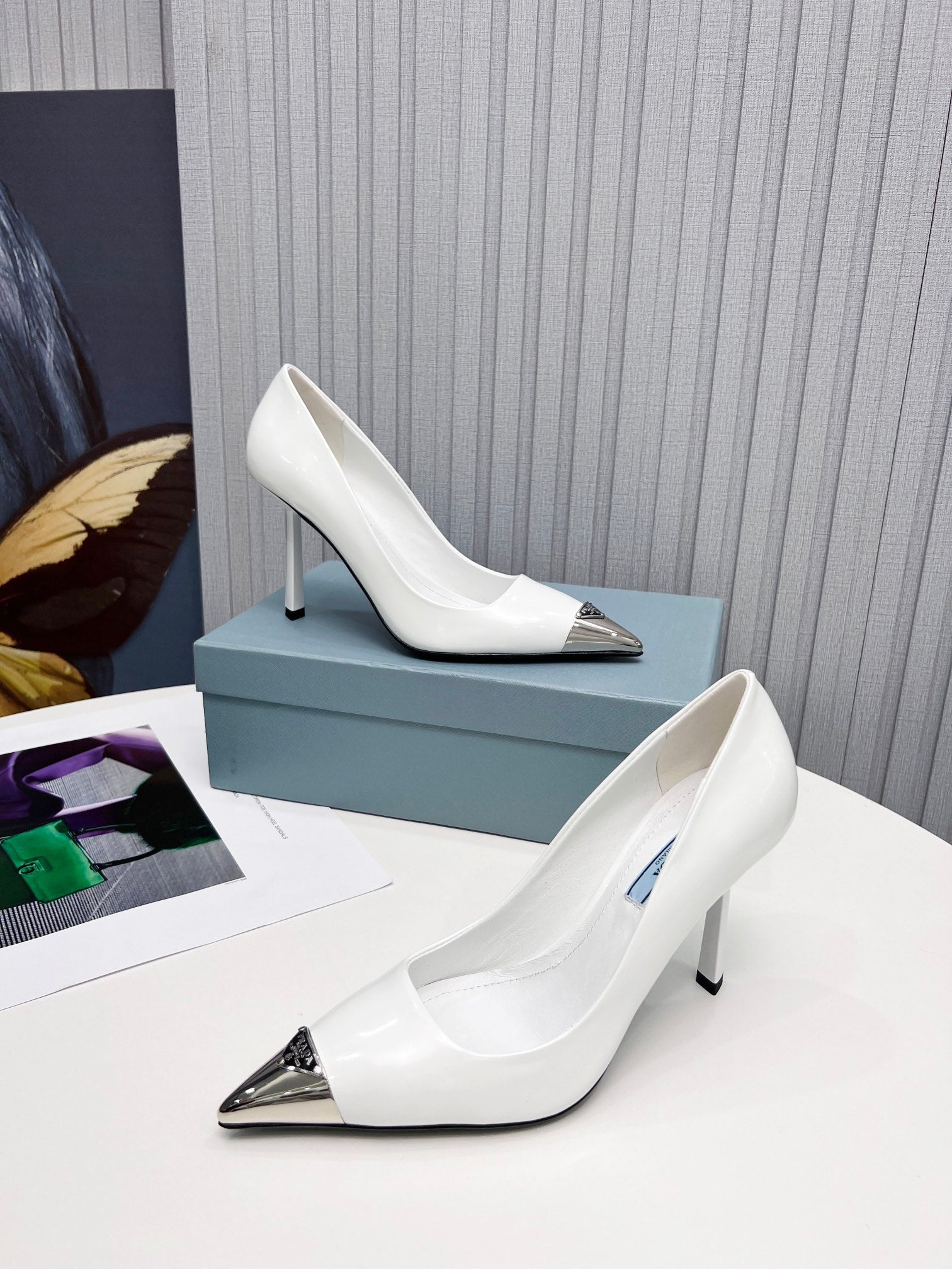PRADA 26S PUMPS STILETTO HEEL 95MM IN WHITE METAL TIP CALFSKIN