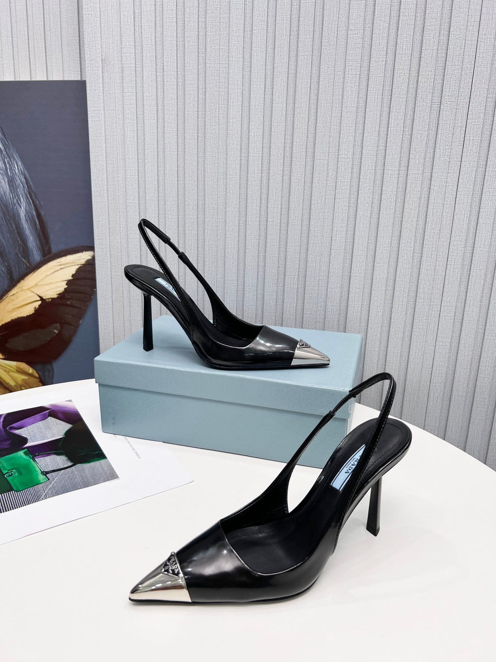 PRADA 26S SLINGBACK HEELS 95MM IN BLACK METAL TIP CALFSKIN