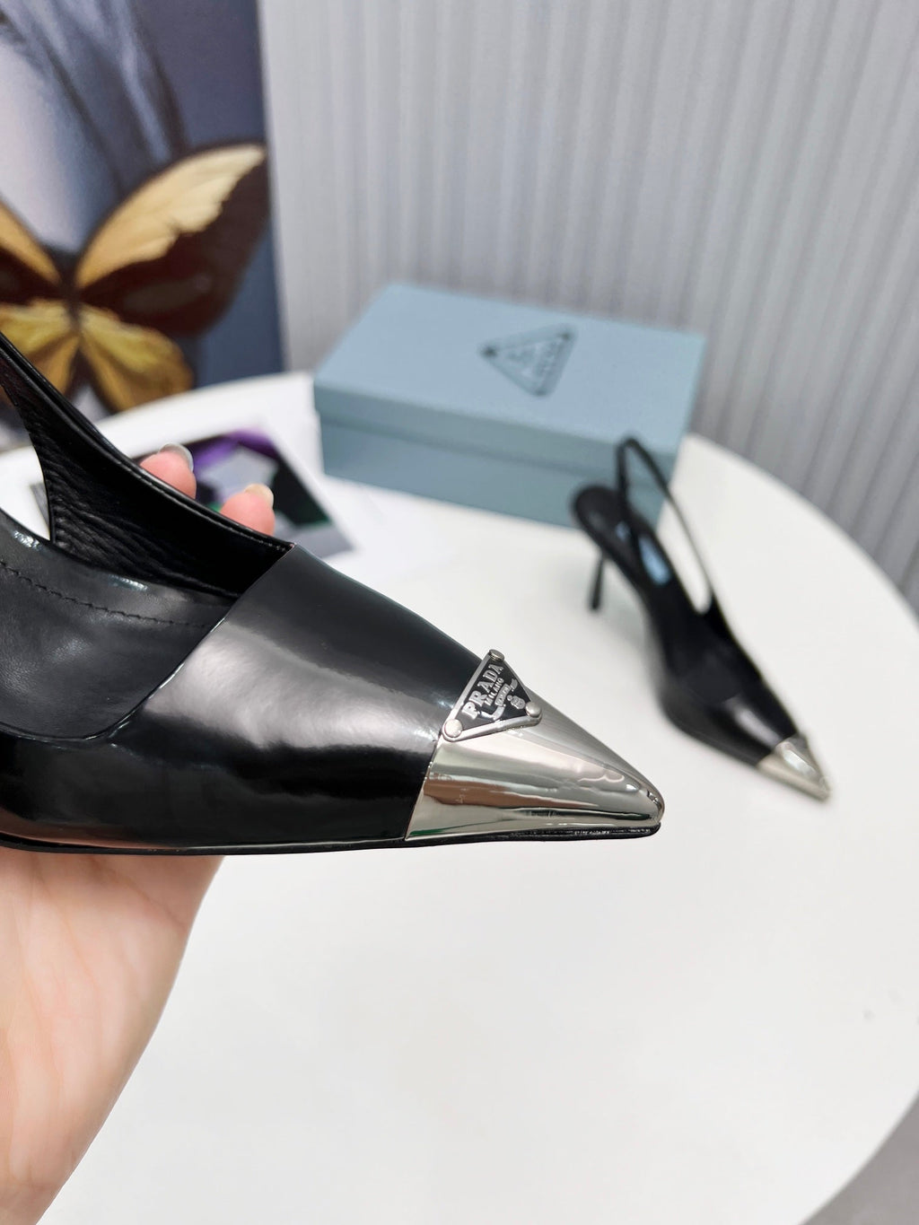 PRADA 26S SLINGBACK HEELS 95MM IN BLACK METAL TIP CALFSKIN